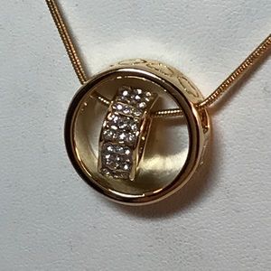 Round pendant necklace in gold tone, 16 in total length, hearts on penda…